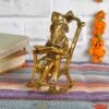 Ganesha reading Ramayan - Golden