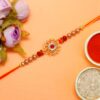 Red Stone Metal Centerpiece Premium Rakhi