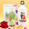 Floret Couple Rakhi with Printed Bottle