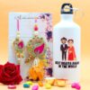 Floret Couple Rakhi with Printed Bottle