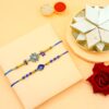 Pack of 2 Evil Eye Rakhis & Kaju Katli Combo